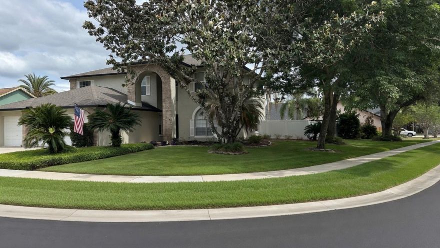 Welcome to this spacious 5-bedroom, 3-bath pool home offering 3,646 square feet of interior living space plus an additional 400 square foot climate-controlled patio on a 0.31-acre corner lot in the desirable Tuska Ridge community. Located on a prime curb with strong street presence, the property includes a three-car garage, a 2019 roof, and new white vinyl fencing with eight-foot privacy along the rear boundary.
Inside, the thoughtfully designed floor plan suits families and entertaining needs. The kitchen showcases a stunning real stone island paired with a rich mahogany butcher block, creating both a striking focal point and a highly functional workspace. Fully upgraded in 2026, the home features modern finishes throughout, blending timeless natural materials with contemporary design for a refined, upscale feel. The living areas include custom architectural wainscoting details, custom Plantation shutters over the arched main window, and modern 6-foot-wide sleek fabric panel shades which glide smoothly from the side of the double 12-foot sliding glass doors. The panels stack neatly when open, maximizing natural light while preserving the view of the tropical pool and grotto. A second-story loft provides flexible bonus space ideal for an office or theater/play area, while an additional fifth bedroom or flexible bonus space adds further versatility.
Outside, experience resort-style living with a sparkling pool featuring a dramatic grotto with an expansive tall waterfall, a built-in Tiki bar for effortless entertaining, and an expansive 400 square foot patio. Thoughtfully designed for year-round comfort, the patio is equipped with its own dedicated air conditioning system, creating a seamless indoor-outdoor living experience. The backyard oasis is enhanced by several fruit trees and a very large oak tree that provides natural afternoon shade. Further highlights include fully owned (non-leased) solar power for electricity and a 120-gallon underground propane tank for added energy flexibility.
Tuska Ridge maintains low quarterly assessments of $120 ($480 annually) and features well-kept common areas. The home is zoned for highly rated Seminole County Public Schools, including Rainbow Elementary, Indian Trails Middle, and Oviedo High School. Residents enjoy convenient access to SR 417, along with nearby restaurants, shopping, stores, bike paths, and the Oviedo YMCA, one mile from HCA Oviedo Medical Hospital.
This residence presents practical updates, generous living space, and outstanding outdoor amenities in one of Seminole County’s established neighborhoods. HOA disclosures, including the full MRTA reassertion package and 2026 approved budget, will be provided promptly upon request. Schedule a private showing today.
