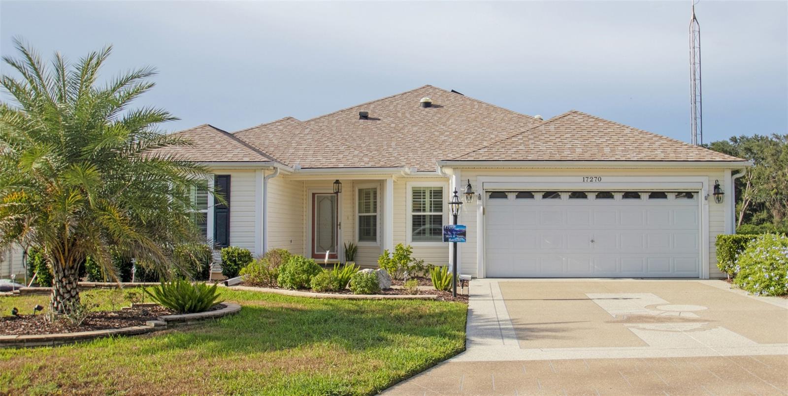 POND VIEW | BOND PAID | $50k maintenance & improvements | NEW ROOF 2023 | FULLY FURNISHED l QUICK CLOSE POSSIBLE
Enjoy PRIVACY, peace, and POND VIEWS from this beautifully UPGRADED AND METICULOUSLY MAINTAINED 3-bedroom, 2-bath Hibiscus model with 1,931 sq ft of living space. Located on a QUIET CIRCLE with NO REAR NEIGHBORS, this home offers tranquility and convenience just MINUTES FROM SHOPPING, restaurants, and the VA Clinic.
Step inside to an open, light-filled floor plan featuring HIGH CEILINGS, CROWN MOULDING, and FOUR SOLAR TUBES for natural brightness. The spacious kitchen has been tastefully upgraded with GRANITE countertops, STAINLESS STEEL appliances, soft-close cabinets and drawers, under-cabinet lighting, pull-out shelving, a breakfast bar that seats four, and a CENTER ISLAND for extra prep space.
The 216 sq ft ENCLOSED AND COOLED LANA overlooks a scenic pond to enjoy viewing the natural habitat and waterfowl that frequent the area. The lanai boasts tile flooring, two ceiling fans, SCREENS, SHADES, POCKET DOORS TO THE OPEN LIVING AREA and a sliding glass door leading to the 15'X4' back patio—perfect for birdwatching or evening cocktails.
The owner’s suite features TWO WALK-IN CLOSETS with CUSTOM BUILT-INS and an ENSUITE BATHROOM with granite counters, DUAL SINKS, and tile flooring. Guests will enjoy their own private space with a separate hallway, full bathroom, and a third bedroom complete with a Murphy bed for flexible use as an office or den.
Additional highlights include an INDOOR LAUNDRY room with a utility sink, upper cabinets, washer, gas dryer, and LARGE PANTRY; a second refrigerator in the garage; ATTIC STAIRS WITH DECKING FOR STORAGE; a SOLAR ATTIC FAN; EXTRA ATTIC INSULATION was added in 2024 to save you money on cooling. The two-car garage features an EPOXY FINISH WITH A 20 YEAR TRANSFERRABLE WARRANTY (2025), a remote controlled GARAGE DOOR SCREEN (2024) and a refrigerator. A HIGH END CUSTOM RAM DESIGN CONCRETE COATING was applied to the driveway, walkway, and front patio in 2025 to make this property stand out and last. NEW ROOF installed in 2023.
Offered FULLY FURNISHED and MOVE-IN READY, this home provides the ideal blend of comfort, upgrades, and location, all with the BOND PAID in full. Don’t miss this rare opportunity to own this spectacular, pond-view home in The Villages! Face Time tour available upon request.