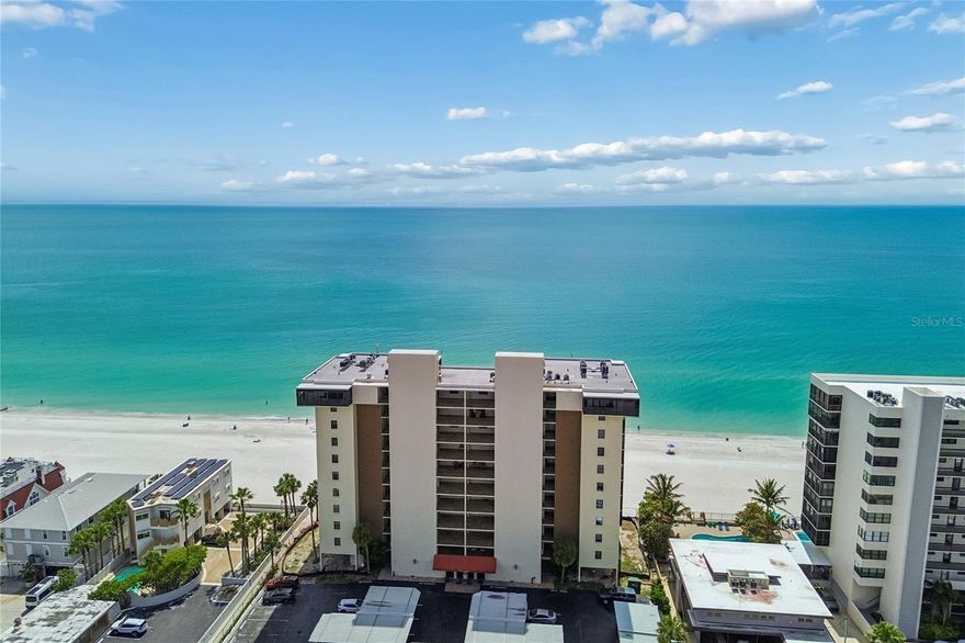 Imagine waking up to the sound of waves and ending your day with breathtaking sunsets right from your wraparound balcony! Are you ready to enjoy Ocean-front lifestyle where the soft sugary sand of vibrant Madeira Beach meets the warm waters of the Gulf of Mexico making every day feel like a vacation? 

Well, here is the opportunity to acquire this fully remodeled, furnished 2-bedroom /2 bathroom /almost 1200sf gem to realize the Best of The Beach Life at the Shores of Madeira, a pet-friendly, mid-size condo building comprising of only 48 units, ALL of which enjoy spectacular Gulf views! This beautiful corner unit with wraparound balcony offers a 180-degree view of the ocean! 

Located in the heart of Madeira Beach, you will be just minutes from John's Pass with a variety of dining and entertainment venues with live music, plenty of waterfront bars and restaurants, and shopping. 
 
This is not only perfect as a primary residence but can also be an income producing investment option as a vacation rental with a minimum thirty-day stay. The floors are tiles and luxury vinyl plank perfect for the beach lifestyle. The kitchen was ergonomically remodeled to cleverly maximize the space. This unit features a full-sized laundry room, and an abundance of closet and storage space. The well-managed building has successfully completed its Structural Integrity Reserve Study (SIRS) assuring its longevity. The secure building features an attractive lobby area and a beautifully remodeled ‘club room,’ which opens onto the pool deck currently undergoing renovations. Once the pool resurfacing is completed in the next couple of months it will provide direct sun as well as a spacious covered area, a fabulous feature not often present. There are BBQ grills, space to store beach toys and of course the main attraction, THE BEACH, is at your doorstep. There is a conveniently located covered parking space and plenty of guest parking.
