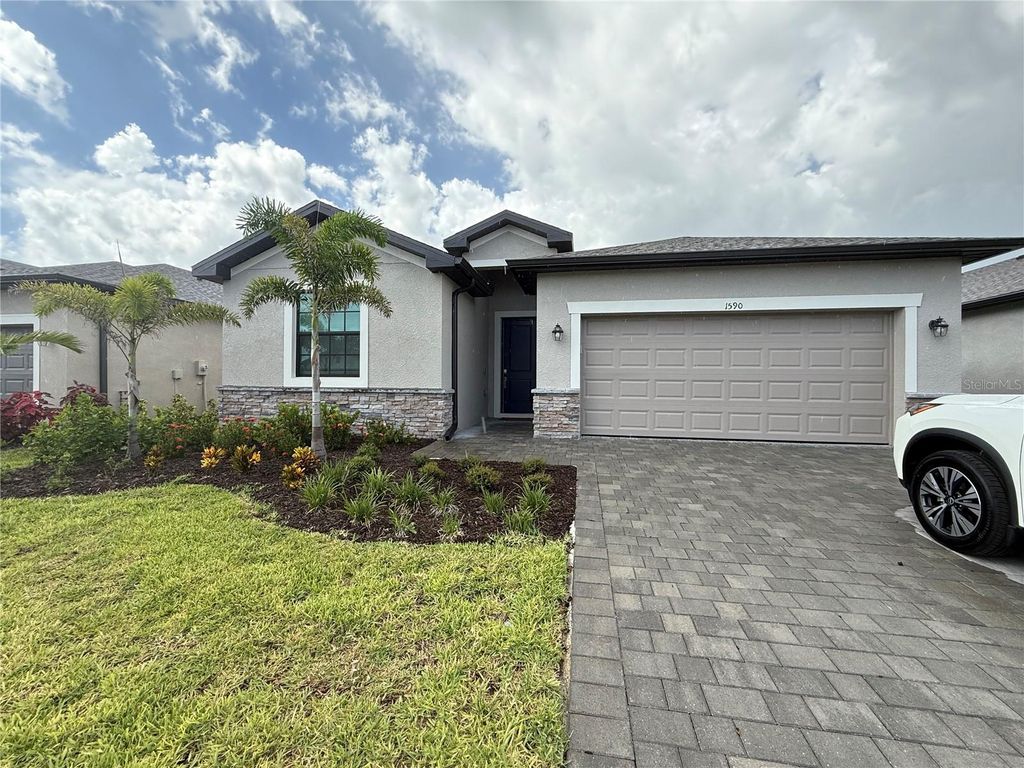 Photo of 1590 Saddlewood Circle, Port Charlotte, FL 33953 (MLS # C7515254)