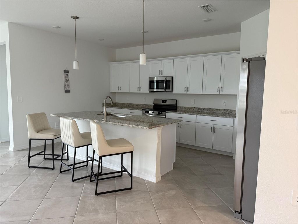 Photo of 1590 Saddlewood Circle, Port Charlotte, FL 33953 (MLS # C7515254)
