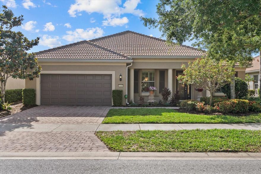 Fully upgraded waterfront pool home in IslandWalk at Wellen Park. This Divosta-built Morningside Lane model offers 3 bedrooms, 3.5 bathrooms, and 2,648 sq ft of air-conditioned living space, plus an additional 966 sq ft of outdoor living on a premium lakefront homesite. Built in 2011 and meticulously maintained, the home features a brand new $90,000 designer kitchen with quartz countertops, custom cabinetry, upgraded lighting, and new stainless-steel appliances including an induction cooktop.

Enjoy true Florida outdoor living with a private heated saltwater pool and extended brick paver lanai overlooking the water. Additional upgrades include updated flooring, tile roof, brick paver driveway, custom designer draperies, high ceilings, and an open-concept split floor plan ideal for entertaining.

The extended garage provides additional parking and functionality, complete with overhead storage racks for optimal organization and extra storage space.

Residents enjoy an event center with catering kitchen, billiards, ping pong, darts, bocce courts, and a fire pit. The resort center features pools, hot tub, fitness area, tennis and pickleball courts. Additional amenities include an arts and crafts room, library, massage room, community garden, two dog parks, playground, and outdoor spaces with grills, lounge areas, and pavilion. Conveniently located near shopping, dining, entertainment, and Gulf beaches.

This home offers the perfect combination of luxury, functionality, and resort-style community living. Schedule your private showing today.