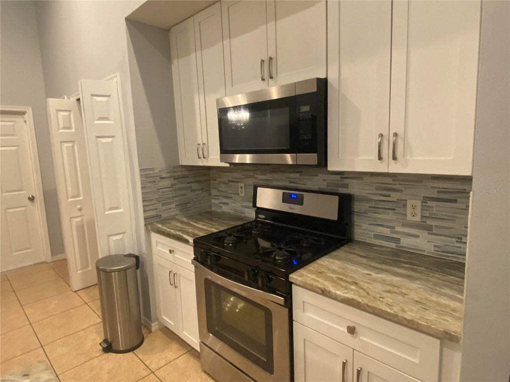Photo of 4864 Gorham Avenue, Orlando, FL 32817 (MLS # O6452453)