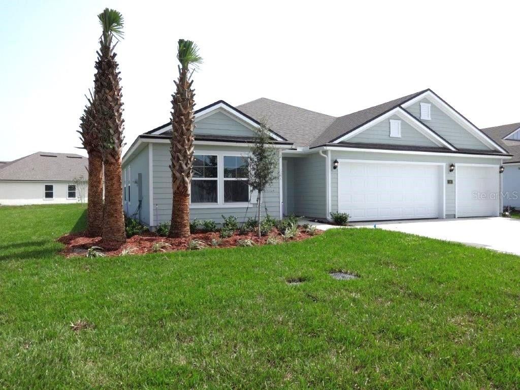 Photo of 39 LUMBER JACK TRAIL, PALM COAST, FL 32137 (MLS # FC292575)