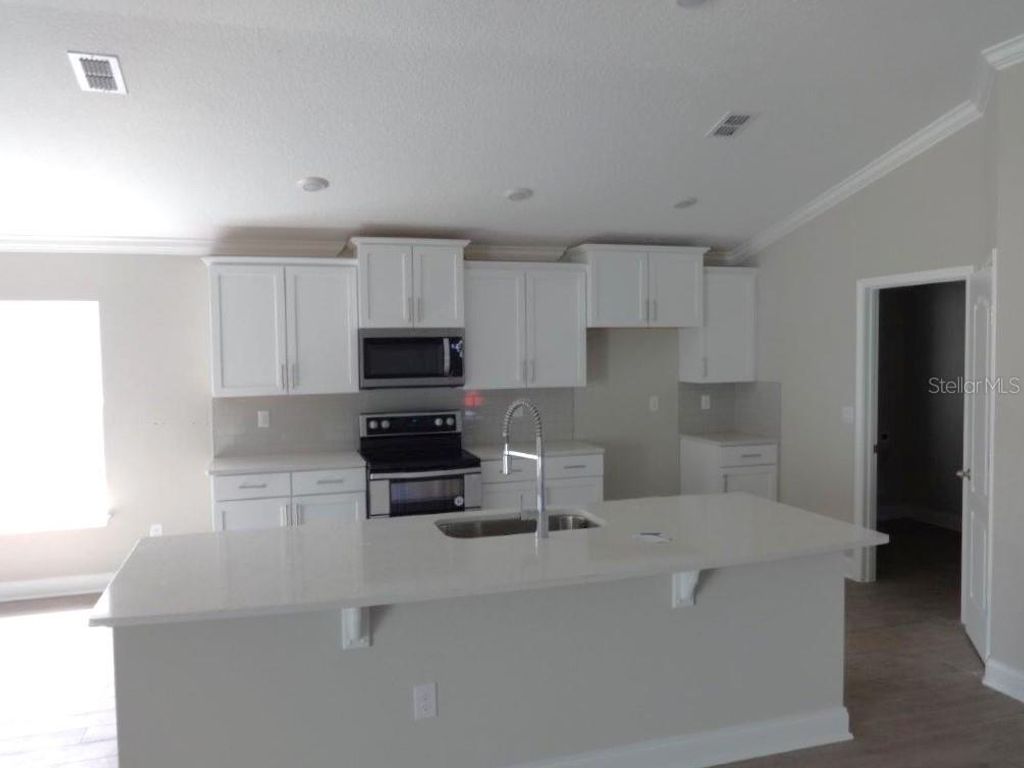 Photo of 39 LUMBER JACK TRAIL, PALM COAST, FL 32137 (MLS # FC292575)