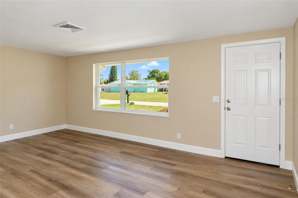 Photo of 3521 Kimberly Oaks Drive, Holiday, FL 34691 (MLS # TB8552753)