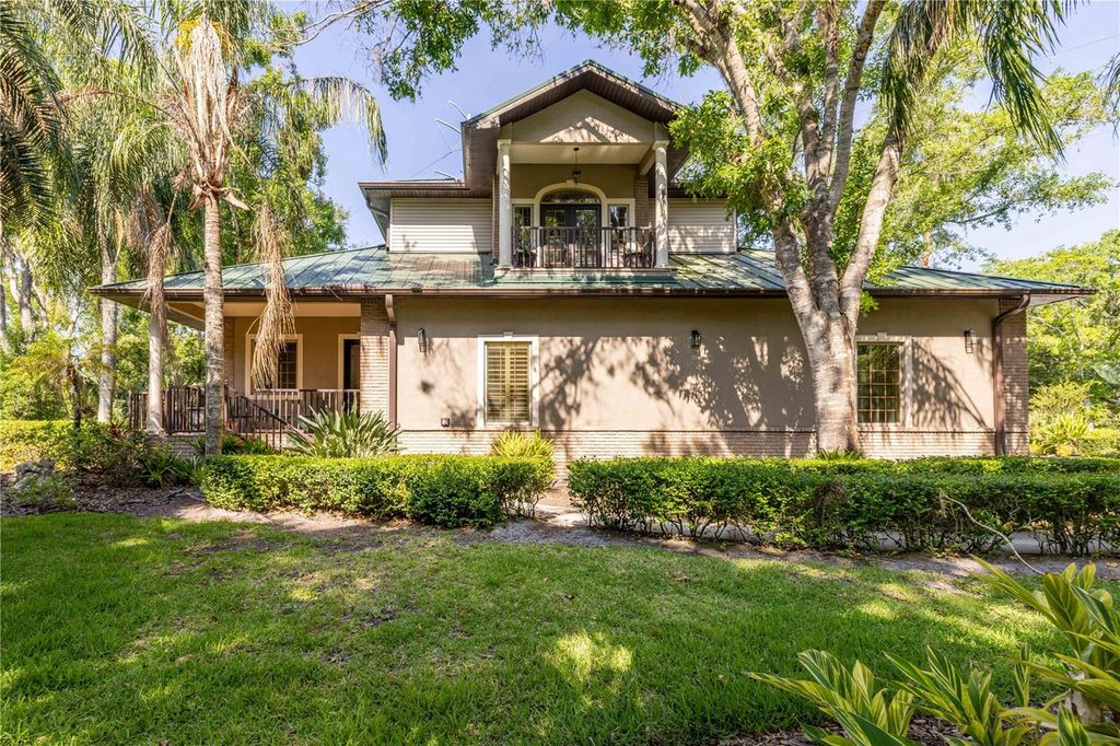 Photo of 1252 E Lake Drive, Tarpon Springs, FL 34688 (MLS # TB8431734)