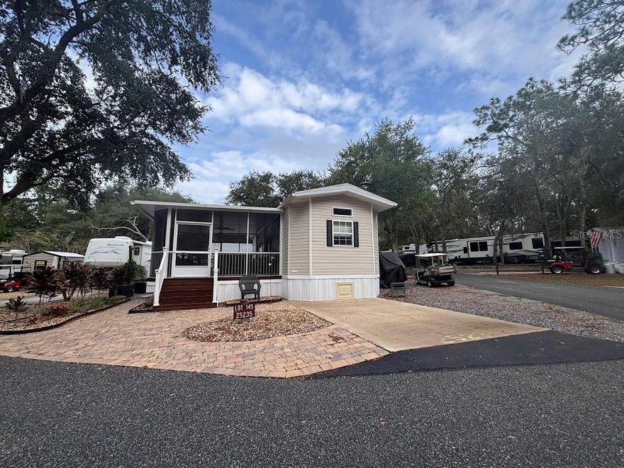This nearly 5000sf Deeded Lot comes with 2017“Chariot Park Model” This unit is stunning and well maintained in every aspect. It comes with a unique and spacious shed that has plenty of storage! 3/27/2023 SCREEN ROOM W/ALUMINUM COMPOSITE ROOF installed for another living space! Parking in the front, side and in the back for all your toys if you wish! Dont let this one slip by! COME ENJOY THE EASY LIVING AT THE SALT SPRINGS ELITE RESORT! Salt Springs Resort has its own boat launch into little Lake Kerr and connects to big Lake Kerr for the fishermen or water activities! Not to mention all the nearby trails for hiking and adventure! Take a day trip and head to the beach, Daytona beach est. 45mins away!  Make this your weekend getaway or permanent home. Better yet Airbnb to make some extra cash. Only 40 minutes from Ocala FL & 23 miles to Palatka FL.. At the end of the day enjoy a swim in the 2 huge pools or shoot some horseshoes, play pickleball or basketball. This resort offers plenty of amenities that will keep you busy.