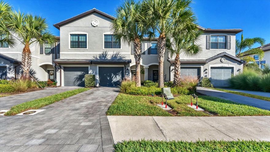 Welcome to Lorraine Lakes in Lakewood Ranch!
This stunning 2022-built townhouse is truly move in ready! Just bring your belongings and settle right in. With 3 bedrooms, 2.5 bathrooms, and a long list of upgrades and recent improvements, this home offers exceptional comfort, style, and convenience. Featuring a welcoming front entry design, the home opens into a beautifully curated living space ideal for both entertaining and relaxing evenings at home. The main floor showcases elegant ceramic tile flooring and a gorgeous kitchen complete with a new tile backsplash, gas range, soft-close cabinetry and pantry storage. The living area includes two custom feature walls, alarmed glass sliders, and hidden under-stairs storage. Step outside to a covered, screened lanai overlooking a tranquil pond, complete with its own storage area for hurricane shutters and extra room for cushions. The updated powder room shines with fresh paint, a new vanity, faucet, mirror, and modern lighting. In addition to the powder room, the first floor, stairwell, and second-floor hallway all feature fresh interior paint for a clean, cohesive look. The concrete built second floor includes access to an attic, providing valuable additional storage. The garage is equipped with a tankless water heater for added efficiency. The HOA makes maintenance effortless by covering roof care, lawn service, mulch, weed control, sprinkler maintenance, plus WiFi and cable internet. Enjoy resort style amenities including a lap pool, recreation pool, and splash pad, along with a clubhouse, fitness center, restaurant, pickleball courts, basketball court, putting green, and more. All this, just minutes from top rated schools, golf, shopping, dining, entertainment, and Florida’s award winning Gulf beaches.
This meticulously maintained townhouse perfectly blends modern living with low maintenance convenience. Don’t miss your chance to make it yours!