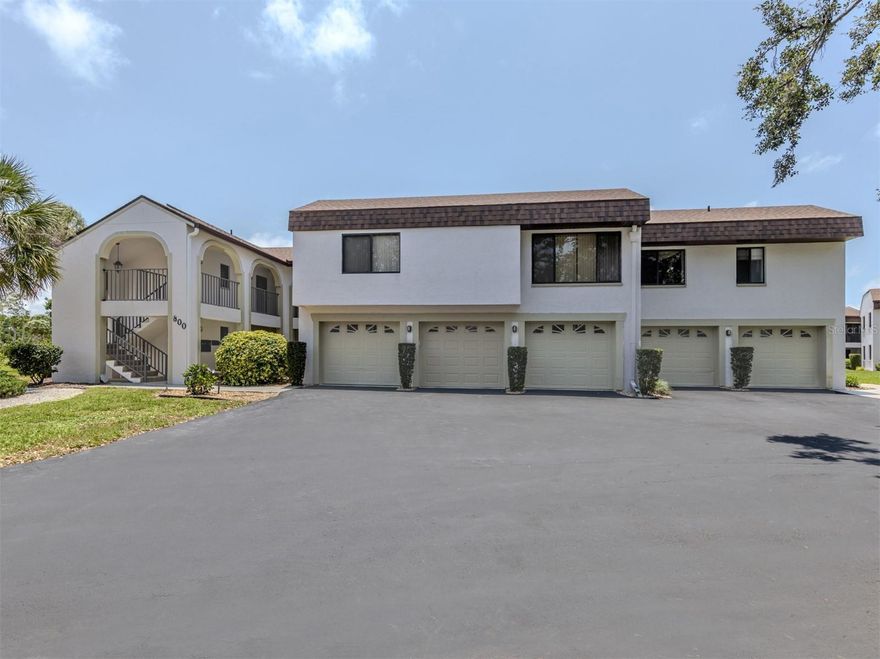 You will be very pleased with this well cared for, one-owner condo in the unique community of Summer Green, just 3.5 miles from downtown Venice Island. All condo buildings have only 5 individual units (2 on the first floor and 3 on the second floor) clustered throughout the scenic grounds bordered by the Capri Isles Golf Club, and highlighted with several ponds, oak & palm trees galore, wooden bridges, 2 pools, and golf course views over much of the property. This particular condo was built during the final phase of construction, and has some features that earlier built units do not have. A popular item would be the separation or split private bedrooms, both of which are suites, with walk-in closets and attached bathrooms on either end of the unit. Also, there is full size washer & dryer at the end of the 15' kitchen, which also has solid surface counters with plenty of work space overall, including over the W&D for a convenient folding area. The lanai has an inspiring view of the pond and golf course you can enjoy all 12 months since it is both screened and glassed in with sliding doors. Other features include new carpeting throughout, water resistant luxury vinyl plank flooring in both bathrooms, and freshly painted walls. Your 1 car garage is huge with extra storage space. There are many condos in the Venice area which you may have seen, but if you want a clean and conveniently located unit,very reasonably priced, you would be wise to check this one out. The original and only owners have only occupied this home for 6 mo out of the year - it's waiting for you to grab the keys!