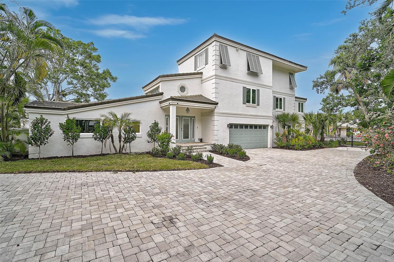 Luxury Canal-Front Oasis in Siesta Key | 4831 Primrose Path
Updated Three-Story Waterfront Retreat with Designer Touches & Flexible Living Spaces
Discover the perfect blend of luxury, comfort, and location at 4831 Primrose Path, a beautifully updated three-story canal-front residence situated on a lush corner lot in one of Siesta Key’s most sought-after neighborhoods. This elegant coastal home offers a rare combination of versatile living space, high-end upgrades, and tranquil waterfront charm—just minutes from Siesta Beach, dining, and shopping.
Primrose has a light and airy feel reminiscent of California coastal homes, featuring light wood floors throughout the second and third floors. The interior is painted a soft white and filled with natural light, creating a serene and uplifting environment. Surrounded by lush greenery, the home offers exceptional privacy and stunning birdwatching views from every level.
Main Floor – Open, Inviting, and Beautifully Renovated
The spacious first level welcomes you with high-end 4x4 porcelain tile flooring, a bright open-concept living area, and seamless access to the outdoors. Three generously sized bedrooms and three fully remodeled bathrooms provide ample comfort for guests or family. The designer kitchen features premium cabinetry, sleek modern appliances, and a side slider opening to a private courtyard—perfect for quiet mornings or evening gatherings. Large glass sliders frame your view of the tropical backyard oasis, where a sparkling pool and peaceful canal backdrop create the ultimate retreat for entertaining or unwinding in true Florida style.
Second Floor – Flexible Space for mix use
a home office, fitness studio, lounge area or movie room or children’s play area—tailored to meet your lifestyle needs.
Third Floor – A Private Master Sanctuary
The entire third level is dedicated to the primary suite, offering abundant natural light, total privacy, and a sense of serene seclusion. Whether you’re starting your day or winding down, this space invites relaxation and renewal.
Highlights & Upgrades
• New designer tile flooring throughout the first level
• Fully renovated bathrooms with upscale finishes
• Custom kitchen cabinetry and premium appliances
• Fresh interior paint, new baseboards, and professional landscaping
• Direct canal access with peaceful water views
Location Perfection
Ideally positioned just minutes from the world-renowned Siesta Key Beach, 4831 Primrose Path offers easy access to all the charm of island living—boutique shopping, gourmet dining, and the vibrant Siesta Village lifestyle.
Move-in ready and thoughtfully updated, this exceptional canal-front home is a rare opportunity to live the Siesta Key dream. Schedule your private tour today.