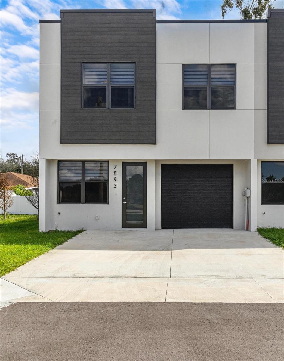 Welcome to Gesualdo Village, where contemporary luxury meets effortless convenience in the heart of Tampa. This newly built townhome is a perfect blend of modern design and sophisticated comfort, offering an exceptional lifestyle for its residents. Inside, you’ll find a bright and spacious 3-bedroom, 2.5-bath layout designed with open-concept living in mind. The expansive great room is ideal for entertaining, while the private patio creates the perfect retreat for quiet evenings. The gourmet kitchen features sleek stainless steel appliances, custom cabinetry, and stylish finishes, making it as functional as it is beautiful. Upstairs, spa-inspired bathrooms with floor-to-ceiling tiled showers provide a touch of everyday indulgence. Perfectly located, Gesualdo Village puts you close to everything Tampa has to offer. You’re just minutes from Tampa International Airport, Raymond James Stadium, and International Plaza, with quick access to the Veterans Expressway and Courtney Campbell Causeway. Whether you’re heading to the Tampa Riverwalk, the Channel District, or the white sands of Clearwater Beach, you’ll love the ease of getting around. Don’t miss the opportunity to call this stunning new home yours—where modern living, convenience, and style come together in one exceptional address.