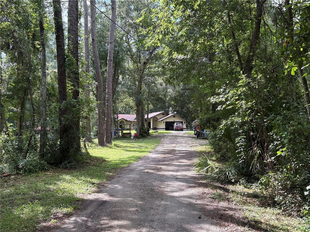 Photo of 7107 Cedar Lane, Brooksville, FL 34601 (MLS # W7877303)