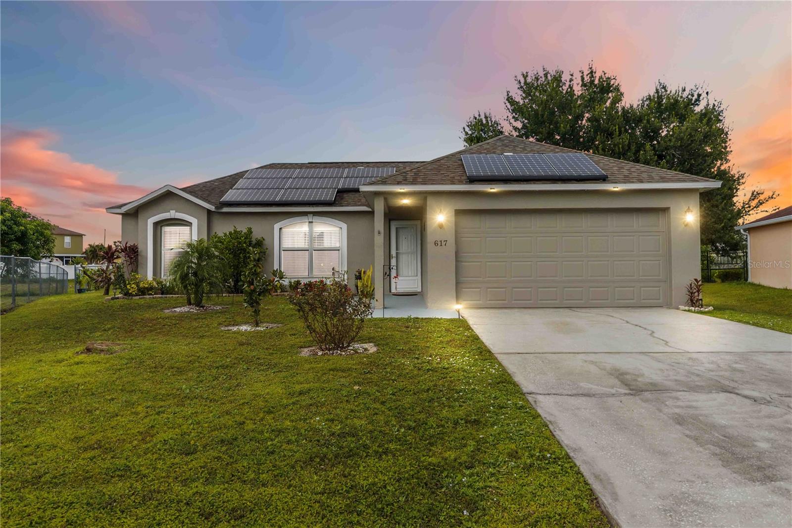Welcome to this move-in ready 3-bedroom, 2-bath home offering comfort, style, and convenience. Nestled on a spacious cul-de-sac lot, this home features a thoughtfully designed split floor plan. Step inside to find a bright, open layout with a seamless flow between the living, dining, and kitchen areas. The modern kitchen includes updated cabinets and refreshed countertops—perfect for everyday cooking and entertaining. The private primary suite is set apart from the secondary bedrooms, while the additional rooms are generously sized for family, guests, or a home office. Enjoy outdoor living in the large fenced backyard, ideal for gatherings, pets, or gardening. This home offers peace of mind and low-maintenance living. Conveniently located near shopping, dining, schools, and major highways, it combines comfort and practicality in a welcoming community setting. Don’t miss your chance to own this beautifully updated Kissimmee home—schedule your private showing today!