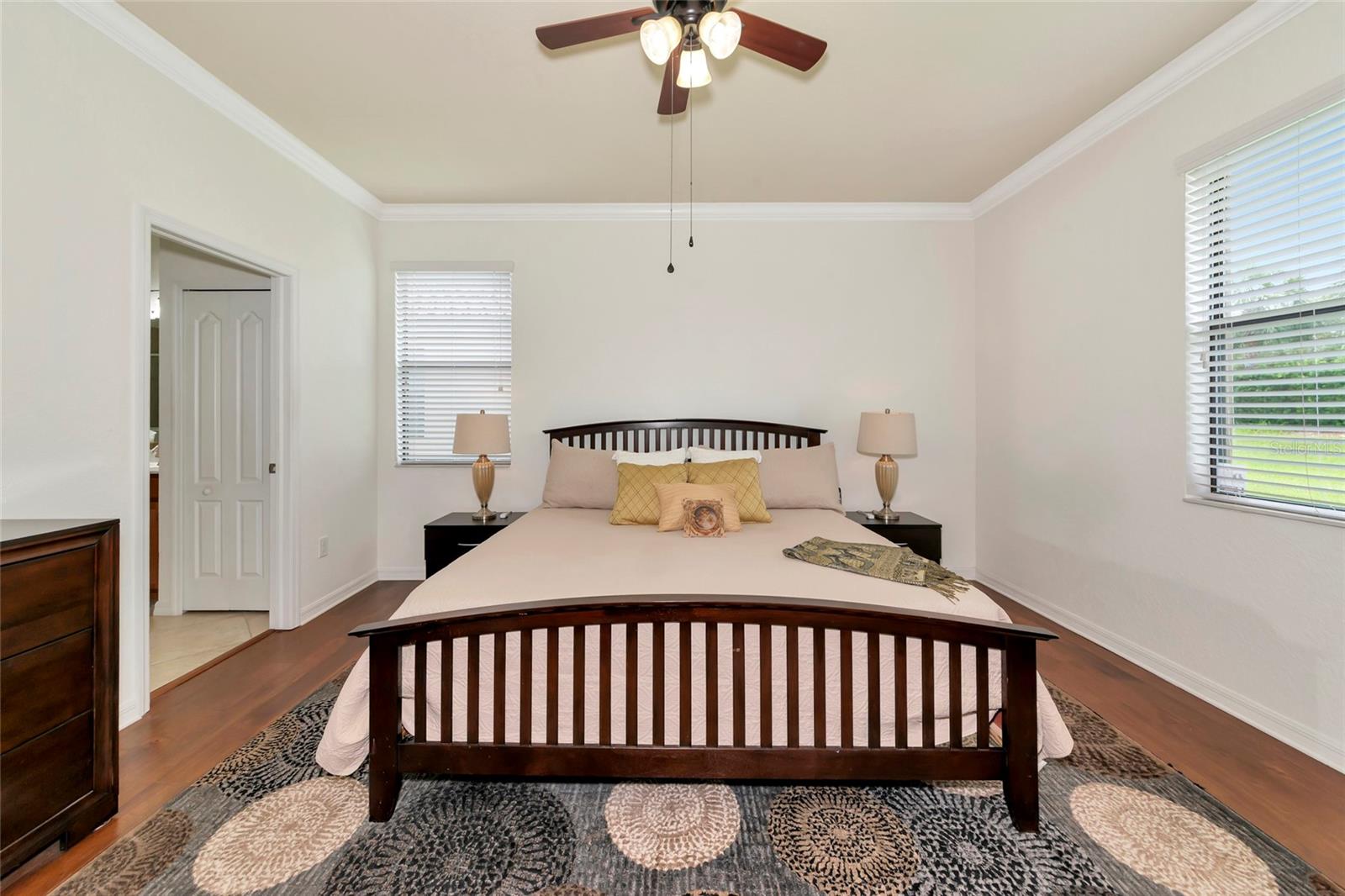 ATTENTION:SELLER WILL PAY $10,000 TOWARD BUYERS CLOSING COSTS. This incentive will help buy down the interest rate, pay for the Capital Contribution Fees and with money left over to pay other closing costs. This is a fantastic opportunity for a home that has so much to offer, so don't delay. The Seller is motivated and wants to hear your offer. The spacious living area is perfect for gatherings and the updated finishes make the home feel fresh and move-in ready. Freshly painted exterior and interior saves you $$$ and gives the home a clean, well-maintained look. With 4 bedrooms and 3 baths there is always room for guests. The open kitchen features a large island for serving or casual dining, granite counter tops, a tile surround kitchen backsplash, and pantry. All of the bedrooms have attractive wood flooring. The extended paver lanai offers additional space to entertain, barbeque, or relax with a book. For security, the poured concrete footer anchors the screen cage. The lanai floor is poured concrete and tile. External lighting creates an atmosphere with an ambient glow at night. A full weather wind sensitive 20 x 20 overhead lighted, retractable awning opens and closes at the touch of a button. Th whole house charcoal water filter system improves the quality of water used for drinking, bathing, and cleaning appliances. The whole house surge protector protects your home’s electrical system and appliances from power surges. Six new improved roof top ventilation units have been installed, and the roof has been sprayed with a shingles sealant. The garage has multiple secured storage units which is always a plus. The whole house Lifetime Termite Control Warranty is transferable. Club dues include a Social Membership to River Strand, lawn and landscape maintenance as well as Spectrum cable and internet. The Sanctuary Community Center is right outside your front door with access to a resort style pool, spa, outdoor patio, pickleball courts, a sports court and state of the art fitness center. The Community Room is a gathering place for special events, and special interest groups. It’s easy to become a part of everything that the Club has to offer. River Strand is an active community with amenities for all interests. There are 2 resort-style pools, hot tubs, Tiki Bar, 8 pickleball courts, 9 har-tru tennis courts, fitness centers, and an on-site restaurant. Bingo, Name that Tune, Trivia, and Karaoke are held throughout the month. Premiere entertainment is held seasonally as well as live music by the Tiki Bar. Guest speakers and special events are scheduled on a regular basis. A Master Plan is scheduled to begin in May and the entire Clubhouse and Restaurant will undergo a renovation that is sure to enhance the member’s experience. Within the Master Community of Heritage Harbour you will find Costco, Target, Whole Foods, Academy Sports and a list of restaurants and shops built or to be built soon. An Urgent Care Center within the community is convenient for non-emergencies. I-75 is just outside the community, making it easy to go north or south, to the beaches, airports, museums, theatres and so much more. Take this opportunity to make this your “forever home” in a community that is friendly and welcoming.
