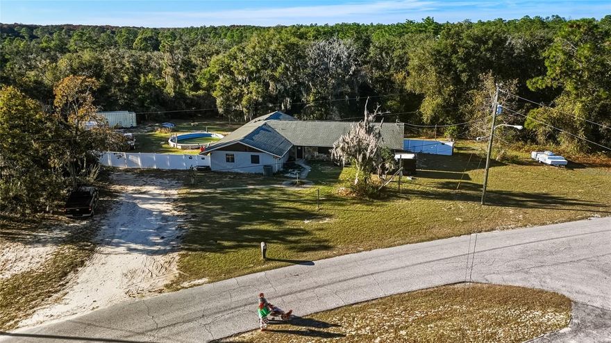 Investor Special! This 3-bedroom, 2-bath home sits on a spacious 0.80-acre lot located outside of the flood zone with no HOA or CDD restrictions. The structure has been deemed a total loss—enter at your own risk—offering a blank slate for redevelopment or a new build. Property is on public water and has a septic system with a leach field installed just 4 years ago. Plenty of potential for investors, builders, or anyone looking to create something new on a large, unrestricted lot.
