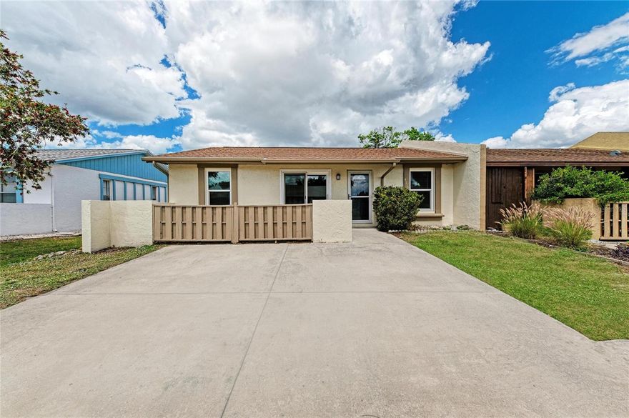 Whether you’re searching for a primary residence, a winter getaway, or an investment property, this West Bradenton home is a fantastic option.  All big tickets items have been taken care of. NEW ROOF 2021 NEW HURRICANE WINDOWS & SLIDERS 2021 NEW WATER HEATER 2021 NEW AC 2024. Discover comfort, convenience, and community in this residence located in a highly desirable Bradenton neighborhood in Flood Zone X. Lakeside South low monthly HOA of $169 covers lawn care, internet, cable and recreational facilities. With an active clubhouse, pool, tennis/pickleball/basketball/shuffleboard courts and playground there's plenty to enjoy!  This home is ideally placed near Blake Hospital, G.T. Bray Park, the YMCA, medical offices, as well as various restaurants and shopping options. You’ll be just under 8 miles from the stunning beaches of Anna Maria Island and the Gulf of Mexico. A true 3-bedroom, 2-bathroom end unit villa with private 2 car driveway right outside the front door. Continuous wide plank tile flooring throughout. No carpets here!  Vaulted ceiling in Living Room creates open airy space. The adjoining eat-in Kitchen features newer cabinetry, granite countertops with Stainless Steel appliances and laundry closet with stack washer/dryer. Sliders open onto bright and light glass enclosed Florida Room ideal for quiet retreat, office or playroom. The primary bedroom has a walk-in closet with built-ins and a beautifully remodeled bathroom with walk-in shower. Two additional bedrooms share the convenient hall bath. Just a short drive away, you’ll find attractions like the Riverwalk, Robinson Preserve, DeSoto National Park, and Palma Sola Botanical Gardens. Sarasota is within a 30-minute drive, offering St. Armand's Circle, Van Wezel Performing Arts, Sarasota Opera House, Asolo Theater, and Selby Gardens. To the north, Tampa Bay and St. Petersburg provide access to Tropicana Field, Raymond James Stadium, Amalie Arena, and Busch Gardens. And if you’re up for an adventure, plan a day trip to Orlando for the magic of Disney World and Universal Studios, just a 2.5-hour drive away. Don’t miss out—ask your Realtor to schedule your private showing today! Seller is licensed Realtor.