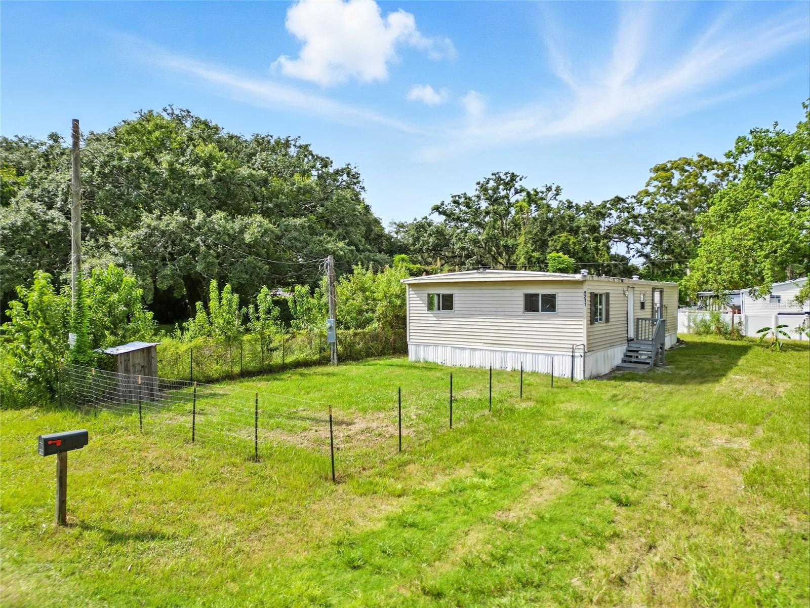 Solid investment or starter opportunity in New Port Richey! This 3-bedroom, 2-bathroom single-wide mobile home sits on its own land with no HOA nor lot rent. The lot is equipped with power, well, and septic, and impact fees have already been paid.
The home is livable but would benefit from updates. It offers a great layout and could be refreshed for rental income or long-term use. Located in a quiet residential area with convenient access to US-19, the Suncoast Parkway, local shops, and schools.
Whether you're looking to invest or live affordably, this property has solid potential with no monthly fees and plenty of flexibility.