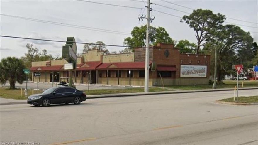 Prime Retail/Restaurant Opportunity in Okeechobee’s Booming Growth Corridor Seize this rare opportunity to acquire a once-thriving 4,580± SF restaurant facility with an additional 2,500± SF of prime retail/office space—perfect for expansion, lease income, or potential condo resale. Situated on a 1-acre corner lot with full median turn access, this high-exposure site offers exceptional visibility, signage, and abundant parking along one of Okeechobee’s busiest commercial arteries. Located just 1 mile north of Walmart and positioned directly on the main retail route to Home Depot, Aldi, and Publix, this property sits at the heart of Okeechobee’s most dynamic trade area. Surrounding development includes new residential communities and the planned Bass Pro Fishing Resort at Lake Okeechobee, projected to bring a surge of tourism, jobs, and retail traffic to the region. Whether you’re an owner-operator seeking to reopen or reimagine a restaurant in a proven location—or an investor pursuing strong income potential and long-term appreciation—this property offers unmatched upside and flexibility. The additional 2,500 SF can be separately leased or sold as an office/retail condo, providing immediate value-add potential. Highlights: 1-acre corner lot with full median cut & high visibility 4,580± SF restaurant + 2,500± SF flex/office or retail space Excellent parking, signage, and traffic flow 1 mile north of Walmart / near Aldi, Publix & Home Depot Within Okeechobee’s fastest-growing retail & residential corridor Zoned for commercial use with multiple reconfiguration options Surrounded by major retail, new housing, and destination development Act fast—properties with this much exposure, access, and potential are rarely available in Okeechobee’s expanding retail corridor.