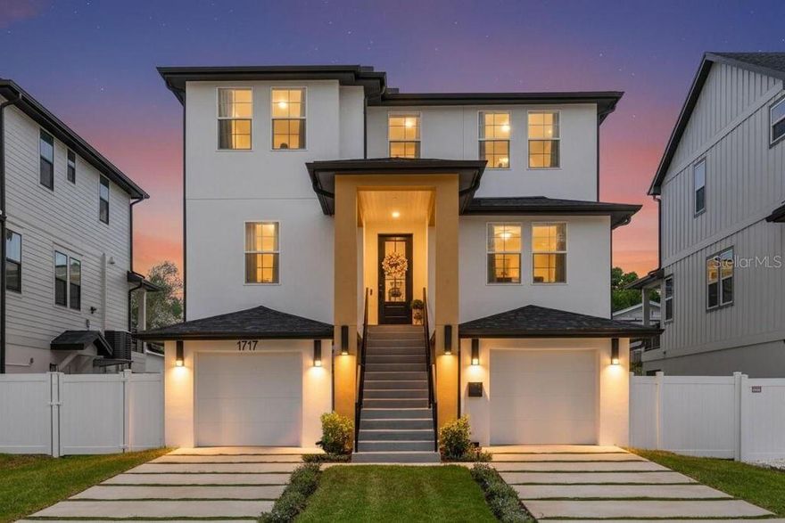 Welcome to your new home on Massachusetts Ave NE in Saint Petersburg! This charming residence was built by one of St Pete's premier builders, Bay to Bay Group. This home features 4 bedrooms and 3 full bathrooms in a spacious 3-story layout with natural light filling each space. The well-appointed kitchen is light and airy and boasts modern appliances and quartz countertops, ample storage and counter space with an island and walk-in pantry. Relax by the fireplace in the Main Living Room or retreat to the 2nd floor additional Family Room. Enjoy a morning cup of coffee on the balcony, make a cocktail at the Dry Bar with wine fridge, or soak into relaxation in the primary bath free-standing tub. This home has it all, from a large 3-car Garage, Mudroom, separate Laundry Room, built-in pest control, irrigation, to a covered 2-room patio overlooking the backyard...with enough space for a pool! Conveniently located just minutes from Downtown, Beach Drive, and most private schools, this property is a wonderful place to call home.