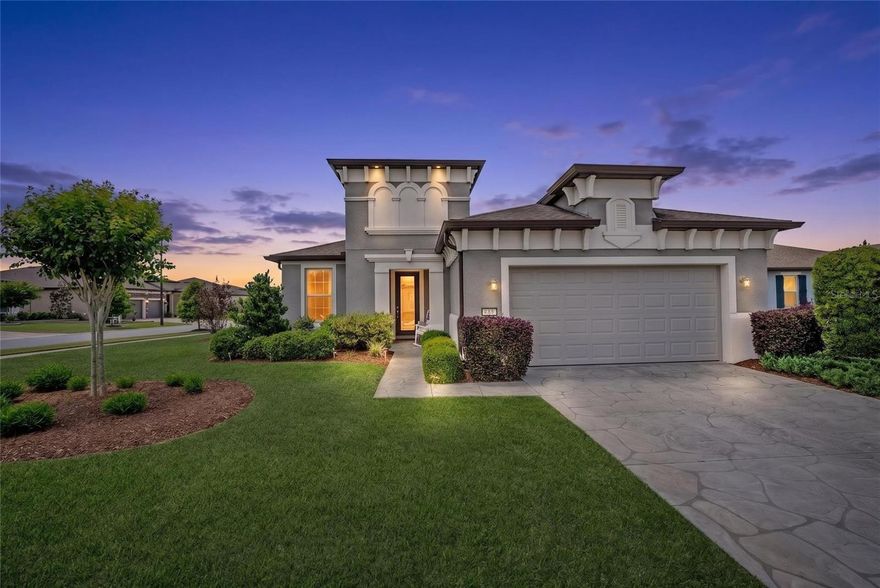 Welcome to resort-style living in this beautifully upgraded Castle Rock model located on a quiet cul-de-sac in the highly sought-after 55+ community of Del Webb Stone Creek.

From the moment you arrive, you’ll notice the stamped concrete driveway and entry, along with an inviting front door featuring an elegant glass inset. Inside, this home showcases luxury vinyl plank flooring throughout with tile in the bathrooms—no carpet anywhere, creating a clean, modern feel that’s both stylish and low maintenance. Crown molding adds a refined touch, while abundant natural light is complemented by custom blinds and 3M window tinting, enhancing comfort, privacy, and energy efficiency throughout the home.

The heart of the home is the gourmet kitchen, complete with granite countertops, stainless steel appliances, and ample cabinetry, making it ideal for both everyday living and entertaining. Just off the main living space, glass French doors lead to a versatile flex room, perfect for a home office, hobby space, or guest overflow.

Step outside to your screened birdcage lanai, offering a peaceful outdoor retreat to relax and enjoy Florida living year-round.

The primary suite is designed for comfort and convenience, featuring a zero-entry walk-in shower, while the guest bathroom includes a beautifully tiled shower for added style and durability.

Additional upgrades include a garage with epoxy-coated flooring, a water softener system, and the home is wired for a generator—providing added peace of mind.

Located within Del Webb Stone Creek, residents enjoy access to an impressive array of amenities designed to support an active and social lifestyle. This guard-gated community features expansive clubhouses, indoor and outdoor resort-style pools, a state-of-the-art fitness center, an 18-hole championship golf course, on-site dining, and a full calendar of clubs, events, and activities, including pickleball, tennis, and more.

Whether you’re looking to stay active, socialize, or simply relax, this home and community offer the perfect combination of comfort, convenience, and lifestyle.
