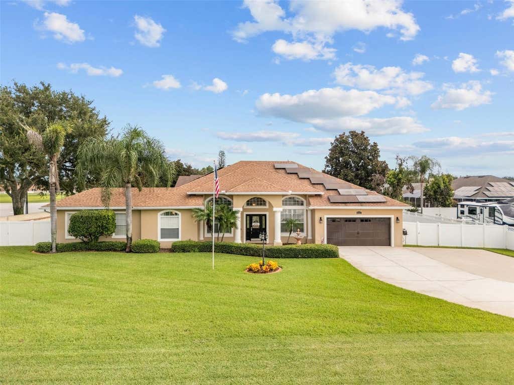 Photo of 651 Hart Lake Drive, Winter Haven, FL 33884 (MLS # L4964010)