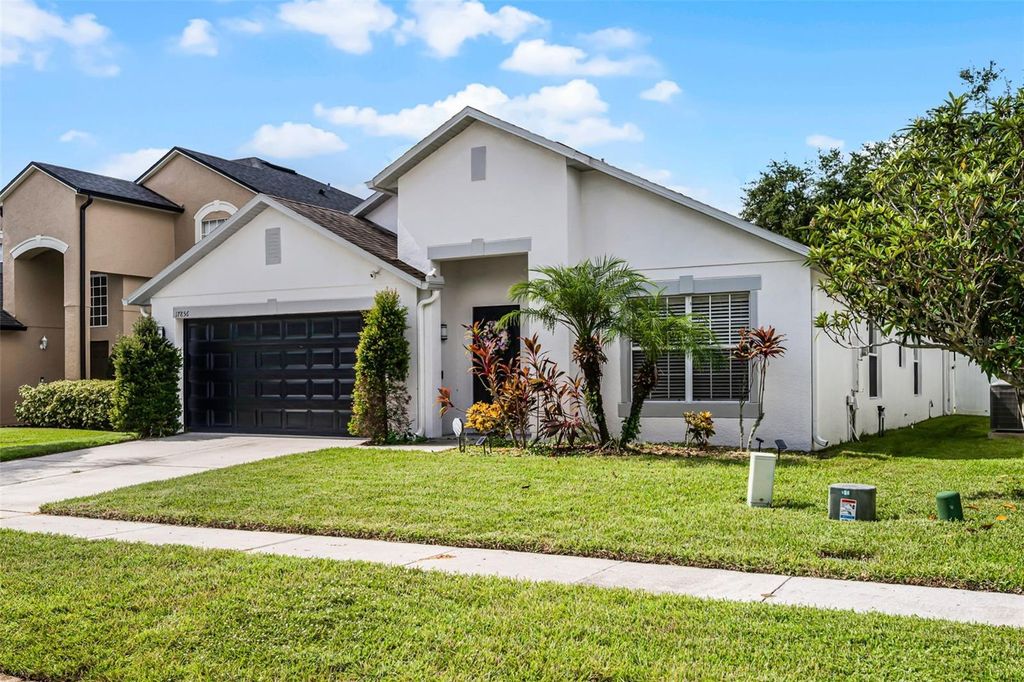 Photo of 17856 Ibis Landing Way, Orlando, FL 32820 (MLS # O6401664)