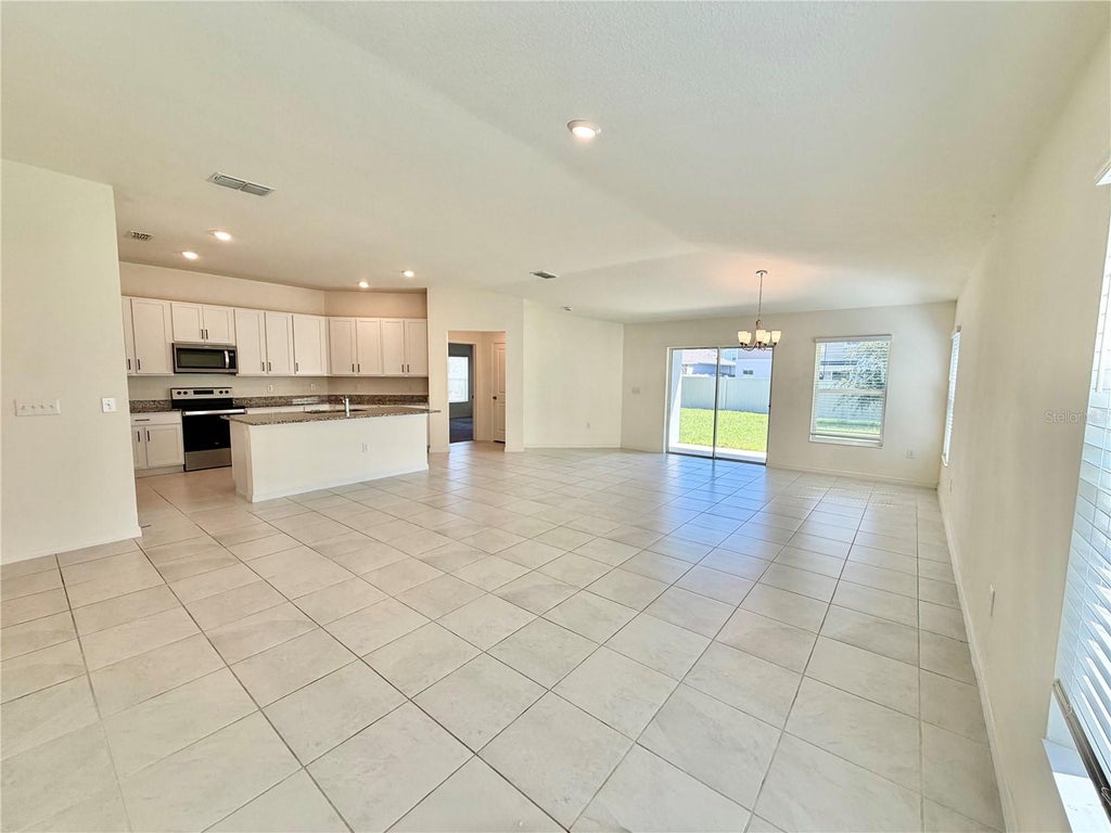 Photo of 240 Summerlin Loop, Haines City, FL 33844 (MLS # L4965969)