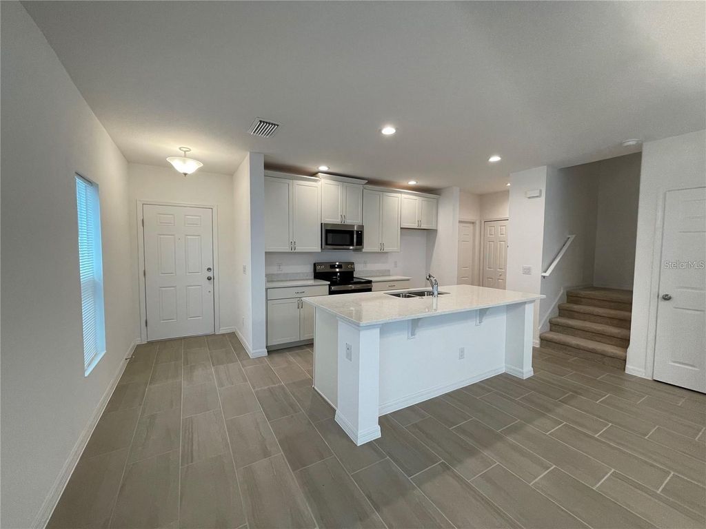 Photo of 1271 Wispy Cypress Drive, Kissimmee, FL 34746 (MLS # O6397362)