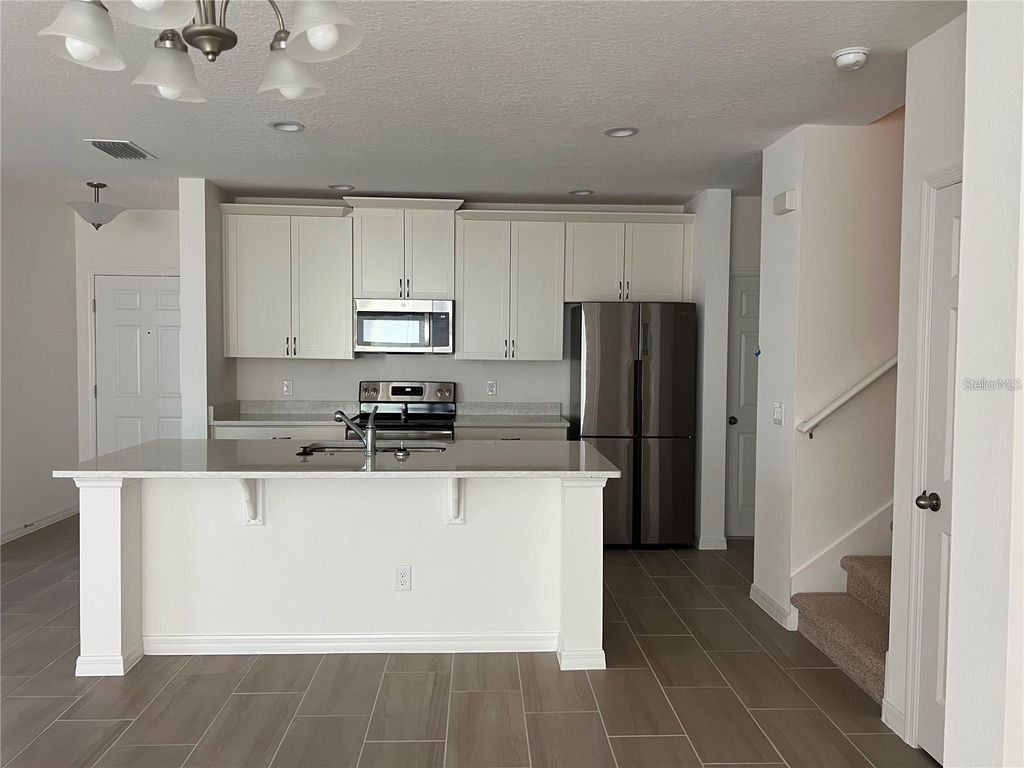 Photo of 1271 Wispy Cypress Drive, Kissimmee, FL 34746 (MLS # O6397362)