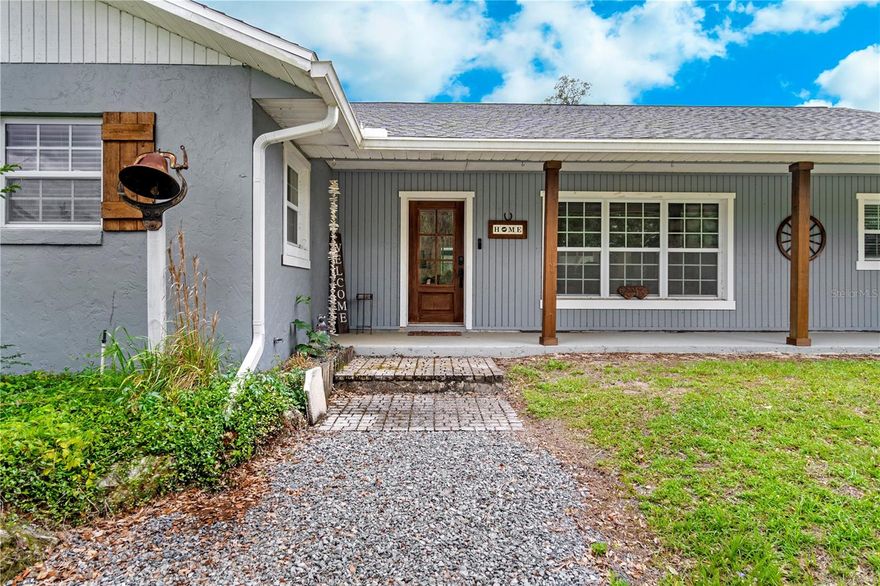 WELCOME HOME TO THE NEIGHBORHOOD OF MEADOW WOOD FARMS EQUESTRIAN COMMUNITY! A rare gem that you don't want to miss! This stunning Ranch Style POOL Home with matching Barn is one for the books and one you won't find again for quite some time. Enter the property though the private electric gated entrance and drive through the stunning Live Oaks with Spanish Moss, Dogwoods, and Florals that provide vibrant and colorful displays year round.  This beautiful 4 Bedroom, 3 1/2 Bath home sits just shy of 7 full areas and  has been fully remodeled through and through. With its light and bright open concept, walk in your new front door to a well lit kitchen and living room area with its rustic feel and perfectly set brick wood burning fireplace. A perfect setup for hosting processional and or Family and Friends for Holiday Seasons. This brand new kitchen boosts a large center island, all new granite countertops & cabinetry, along with all new stainless-steel appliances. Host any size family or friends with its open concept while they relax and socialize by the brick fireplace and watch the summer fun in the pool! This rare gem provides 4 large bedrooms .... with not one but with TWO master suites.  Additional bedrooms are of exceptional sizing. This home has a brand new roof as well as brand new roof on the Barn as well. New septic tank for the home was replaced just few years ago in 2021. The property provides a whole house propane generator that will provide power to both the home and the barn for any season of power loss. The property also has two separate wells that provide water to home, barn and paddocks. The home's matching center isle Barn provides 6 fouling stalls perfect for any outfit. Each stall having its own cold water lines in tact. Any outfit or horse can most certainly appreciate the hot and cold water that is provided to the wash rack in any season. The Barn has a climate controlled office, tack room and storage. The Barn also has its own septic system separate from the home. The land provides 5 fully fenced paddocks that have all been repaired, replaced, and painted. Each sized as equally convenient as the other. There is a brand new 3 door metal structure newly installed for farm equipment, additional vehicle, tack, and trade storage. The subdivision of Meadow Woods is one of Florida's finest and must be experienced and lived. This gem was made for it's family with all the updates and upgrades. Too many upgrades to mention but a few are:

New Roof - House & Barn
All New Gutters
Brand New Pool - Coupled with Enlarged Enclosure
All New Fencing with Some New Repairment and All Painted
New Patio Doors
Bathroom Remodels and Updated
New Kttchen
New Flooring/Carpet
New Appliances
New Crushed Driveway Placed
New Garages Door & Entry Doors
New Lighting Fixtures Throughout
New Security Cameras
New Septic - 2021