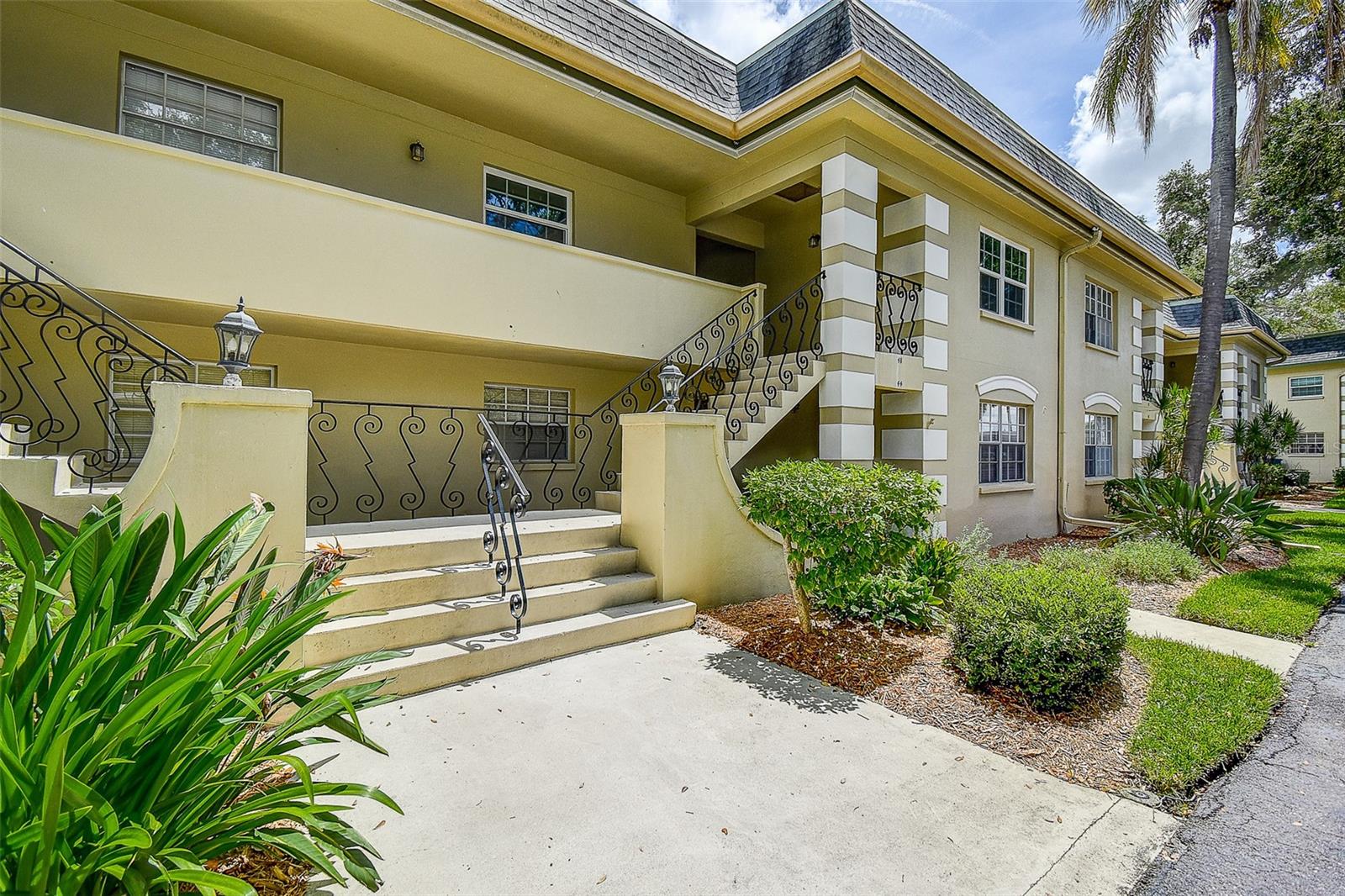 One or more photo(s) has been virtually staged. Discover your perfect retreat in this stunning 2- bedroom, 2- bath condo located on the picturesque East Bay Country Club and golf course. Boasting over 1,200 square feet of well- designed living space, this home is perfect for both relaxation and entertaining. The living room flows seamlessly into the kitchen and dining space, creating an inviting atmosphere. Brand new carpet installed in 2025, freshly painted interior, and all new hurricane impact windows and multi- sliding glass doors saving you THOUSANDS of dollars. Multi- sliding glass doors open almost all of the way enhancing the connection between your indoor and outdoor living space. Both bedrooms are generously sized and complete with their own bathroom. There is no shortage of closet space in this condo either! With a closet in almost every room of the home. Enjoy breathtaking views of the golf course from your own private balcony complete with a private washer and dryer closet. A private parking spot found right outside of your unit with a covered carport and plenty of visitor parking. Enjoy the tranquility of a secluded community with a low HOA of $575 a month. Close to beautiful beaches, excellent shopping, and a variety of dining options. Call today before its gone!