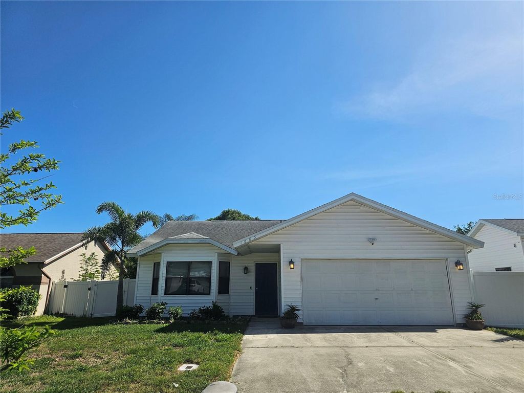 Photo of 1885 Feather Tree Circle, Clearwater, FL 33765 (MLS # TB8503446)