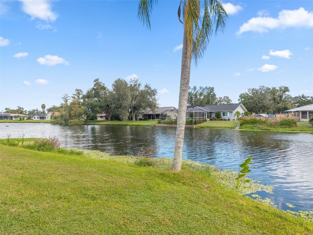 Photo of 8012 Lake Drive, Palmetto, FL 34221 (MLS # A4711224)