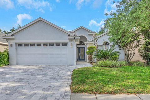 Photo of 18836 Maisons Drive, Lutz, FL 33558 (MLS # TB8457551)