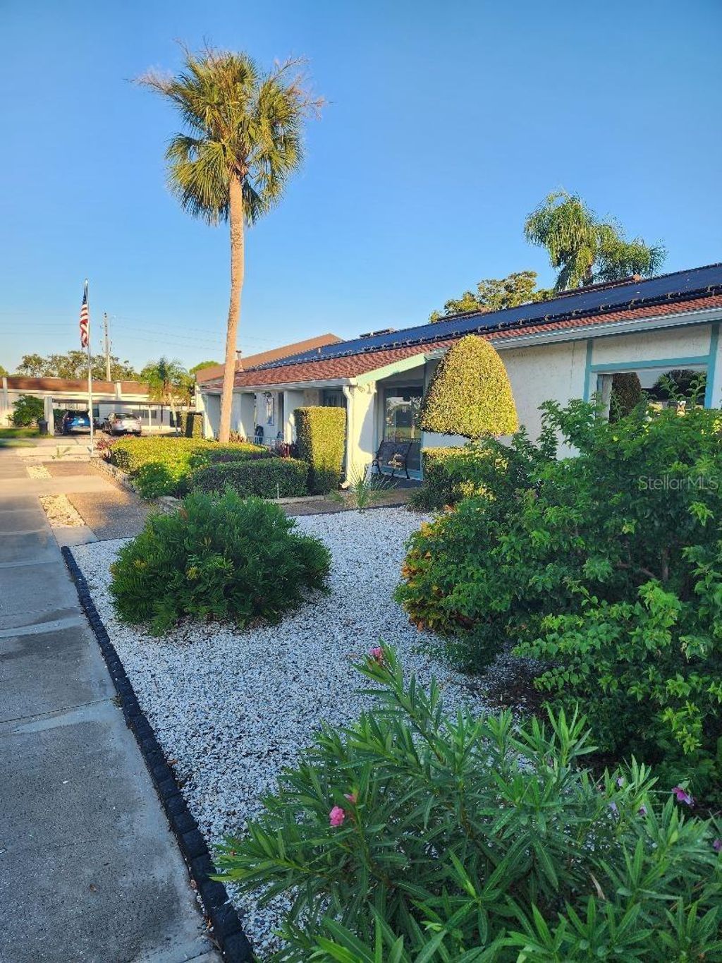 Photo of 9033 Mission Oaks Boulevard, Seminole, FL 33776 (MLS # TB8427708)