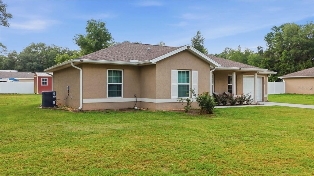 Photo of 14055 SE 43rd Terrace, Summerfield, FL 34491 (MLS # OM725674)