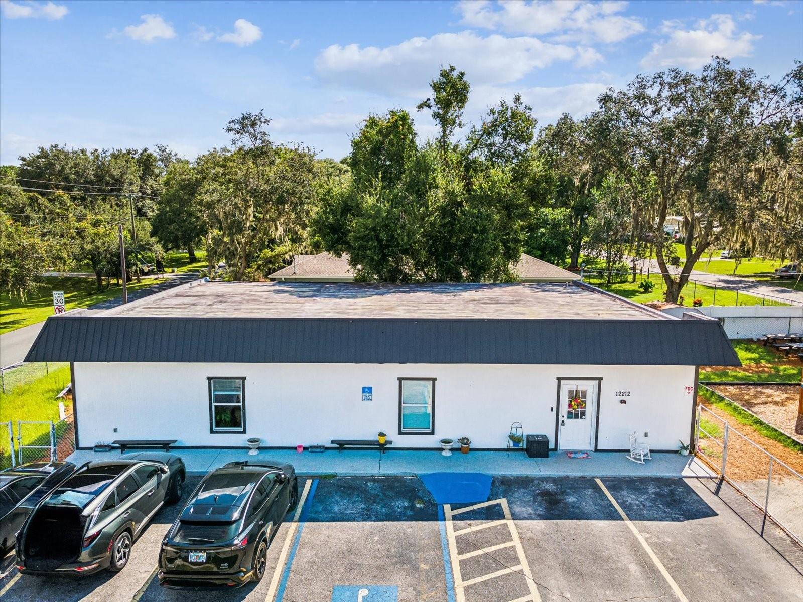 Excellent opportunity to acquire a highly visible commercial building in a prime location! This 2400 sq ft building is zoned C1, allowing for various retail, commercial, and office uses. The property features a corner lot with eight dedicated parking spaces, ensuring easy access for clients and customers. This sale includes a fully leased building currently occupied by a thriving daycare business, offering a fantastic investment opportunity for those seeking reliable cash flow. With an established tenant in place, this property is ideal for investors looking for a low-maintenance, income-generating asset. The building boasts a partially new roof installed in 2023, providing peace of mind for years to come. Don’t miss out on this exceptional opportunity to own both a thriving business and the real estate it operates in. Schedule a showing today!