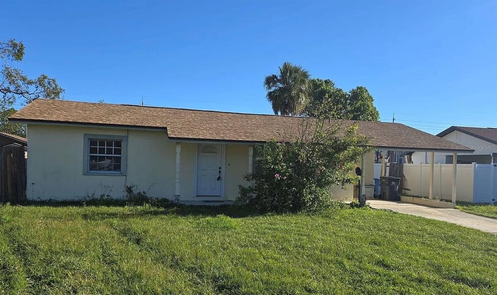Photo of 5005 Stolls Avenue, Tampa, FL 33615 (MLS # O6430421)