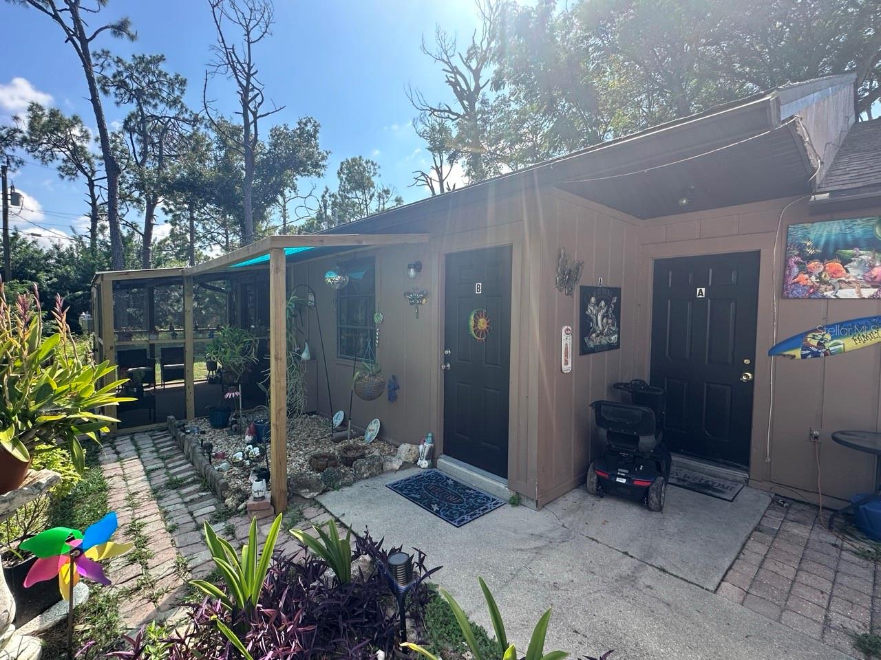 Investment OPPORTUNITY! Step into a cash-flowing property NOW. This is a great opportunity to own a RARE TRIPLEX in Englewood, FL. The front unit is a big 1/1, the middle is a 2/1, and the back is a little 1/1. The building sits on a beautifully wooded property, yet there is still a ton of light and green space. It is a truly unique property with good rent potential, making this a special investment. Text for details!