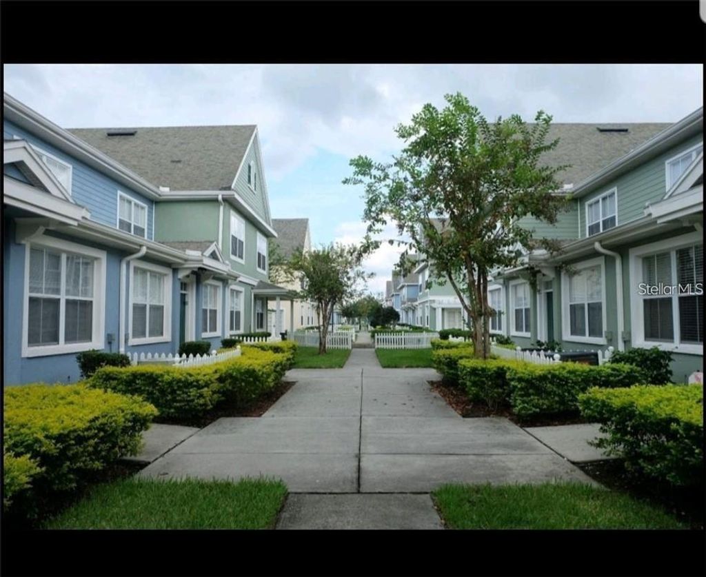 Photo of 4015 Venetian Bay Drive # 103, Kissimmee, FL 34741 (MLS # TB8499749)