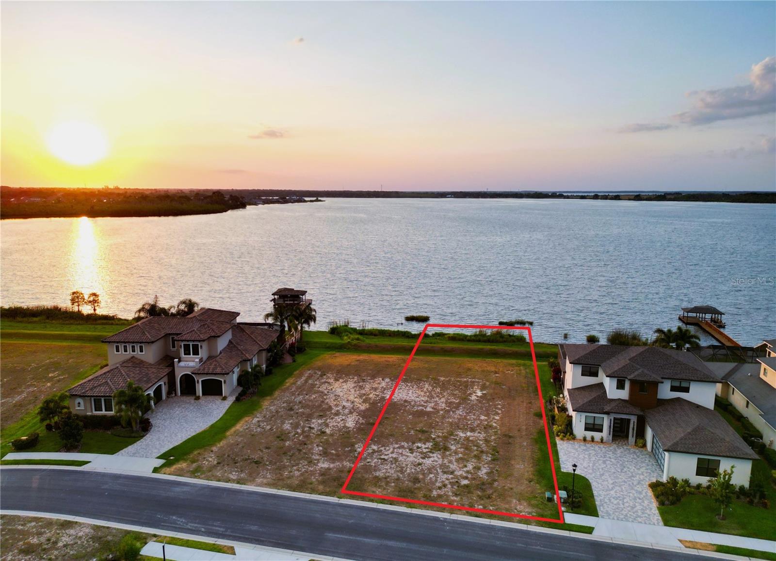 Beautifull Lake Front lot on Lake Van! This lot has one of the most picturesque views in the entire Water Ridge community. Build your custom home here with your own private dock and enjoy all of the activities that come with lake front living. This is one of the nicest lakes in the region and the sunset views from this lot are absolutely spectacular. Don't miss this rare opportunity!
Water Ridge is a one of a kind, upscale, gated community, situated amongst 3 lovely lakes. The community itself provides great amenities such as multiple tennis and pickleball court complexes, 3 pools, boat ramps, access to all 3 lakes, gym facilities, boat storage, community fishing docks and a beautiful club house. It is conveniently located between Tampa and Orlando off the I-4. Close to Universal Studios, Disney Parks, Adams Estates, Shopping, Restaurants and much more!
