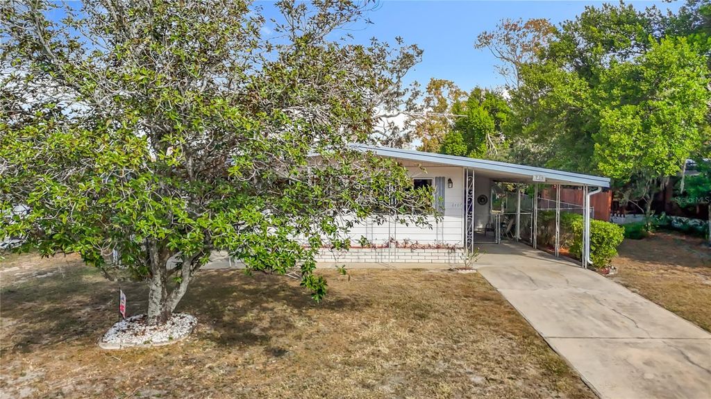 Photo of 8407 Highpoint Boulevard, Brooksville, FL 34613 (MLS # W7881083)