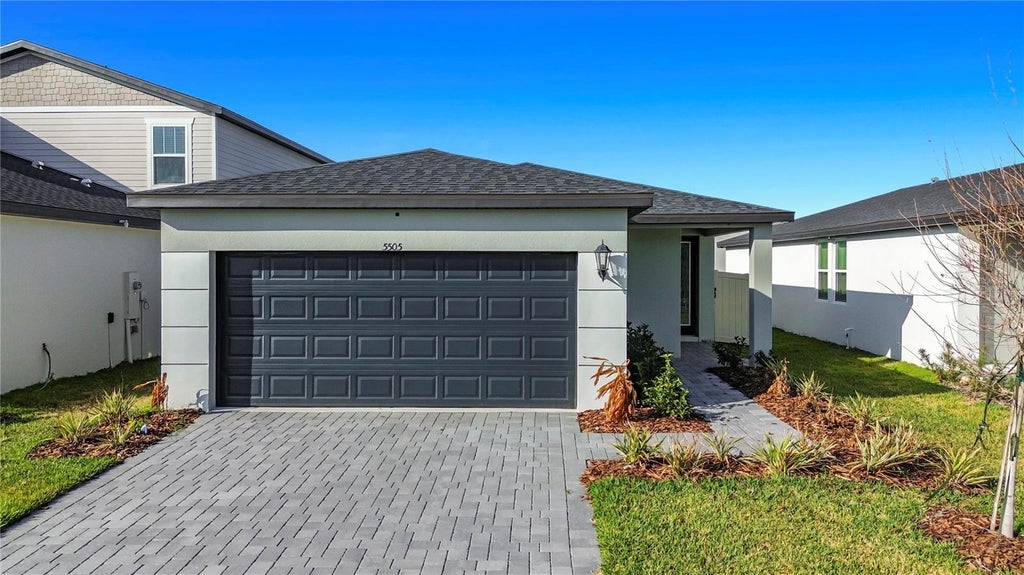Photo of 5505 Clove Row, Haines City, FL 33844 (MLS # O6444103)