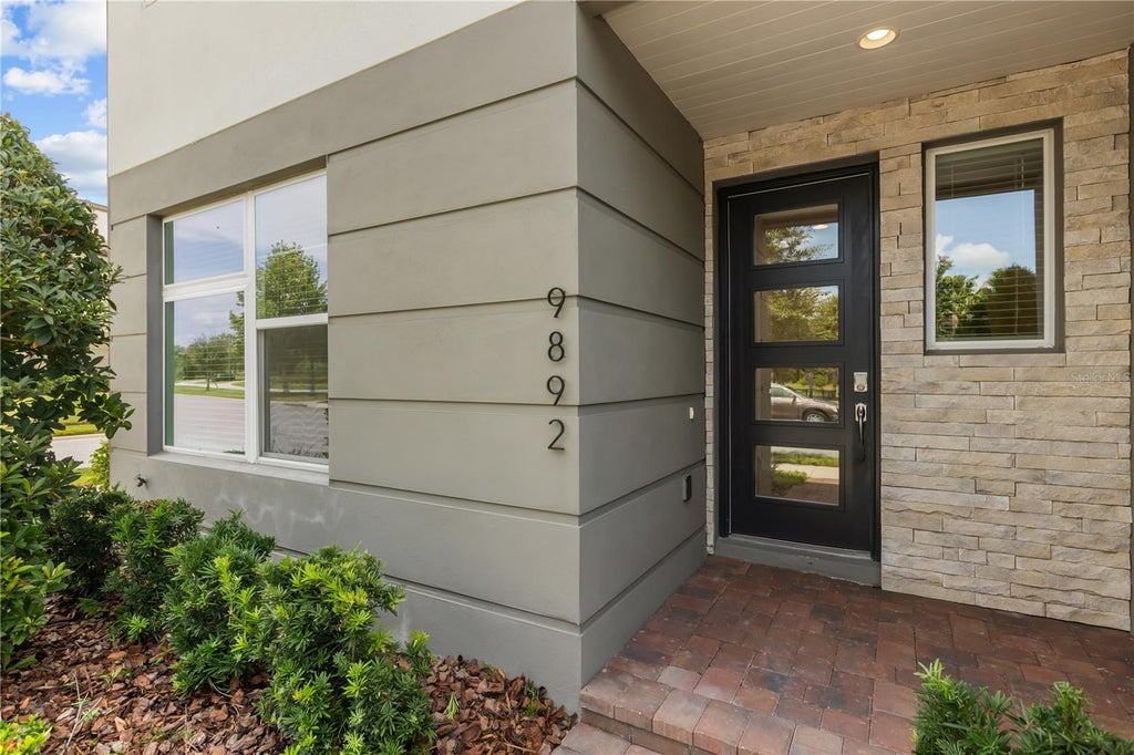 Photo of 9892 Bucklow Hill Drive, Orlando, FL 32832 (MLS # O6436840)