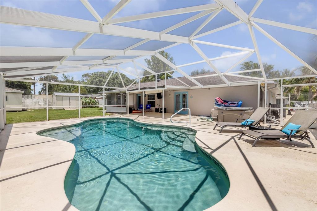 Photo of 2232 Woodland Drive, Edgewater, FL 32141 (MLS # NS1088291)