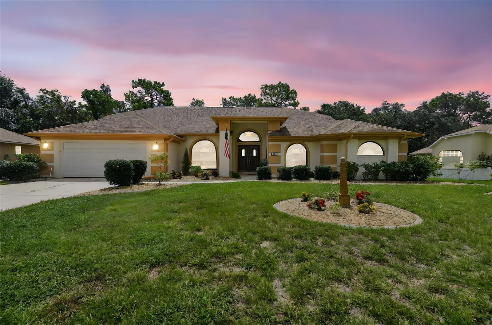 Meticulously Maintained & Beautifully Updated!! This stunning 4-bedroom, 2-bathroom home offers nearly 3000 sq ft of thoughtfully-designed living space, nestled on over ¼ acre in the desirable Sugarmill Woods neighborhood • Surrounded by mature conservation & oversized homesites, this home combines privacy, space, and Designer Upgrades. • Step inside Double Doors to find 11-14’ Soaring Ceilings, Large Sliding Glass Doors, & ABUNDANT Natural Light. The Open Concept floor plan is adorned with **luxury flooring throughout—no carpet—** making it as stylish as it is low-maintenance. • The Family Room features a cozy fireplace and flows seamlessly into the kitchen area & Florida Room • The Updated Kitchen is a dream, with granite countertops & seating, newer appliances, smart-touch faucet, slide-out cabinet drawers, & a built-in pantry—ideal for both casual dining & entertaining. • Formal Living & Dining Rooms create multiple space for hosting & entertaining adding boundless living to this spectacular home. • The Primary Suite includes tray ceiling, private access to the Florida Room, a luxurious bath with soaking tub, walk-in shower, dual vanities, a makeup vanity, & a custom walk-in closet with built-ins. • The 4th bedroom connects to the primary bath—ideal for use as an office, nursery, guest suite or DREAM closet! • Two spacious secondary bedrooms are located privately on the opposite side of the home with a shared full bath featuring a glass-enclosed tub/shower & a convenient door to the backyard—perfect for access to the outdoor living & Large Patio including a cantilevered umbrella for additional shade that conveys with the home. • A TRUE HIGHLIGHT is the Florida Room—over 400 sq ft of additional living space with luxury vinyl plank floors, floor-to-ceiling high-wind-rated windows. This flexible insulated & air-conditioned space can be used year-round for indoor/outdoor entertaining & is a SERENE & COOL place to enjoy the outdoors even in the middle of summer. • Additional features include an indoor Laundry Room with custom cabinetry, stainless-steel sink, tons of countertops for folding, natural light & Extra Storage • Fully fenced yard with lush, fresh landscaping • PLUS an fully irrigated yard powered by private well (no water bill!) • 2 CAR Garage with built-in storage & natural light • This home is filled with thoughtful touches, custom finishes, and major upgrades—truly turnkey and ready for its next owner to enjoy the best of Florida living.
