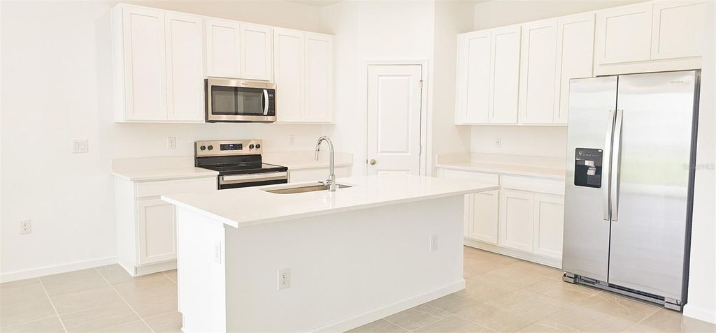 Photo of 413 Silver Palm Drive, Haines City, FL 33844 (MLS # O6394829)