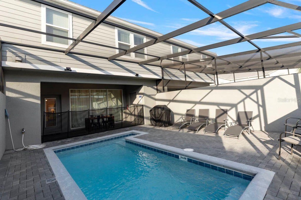 Photo of 7108 Oakmoss Loop, Davenport, FL 33837 (MLS # TB8544924)