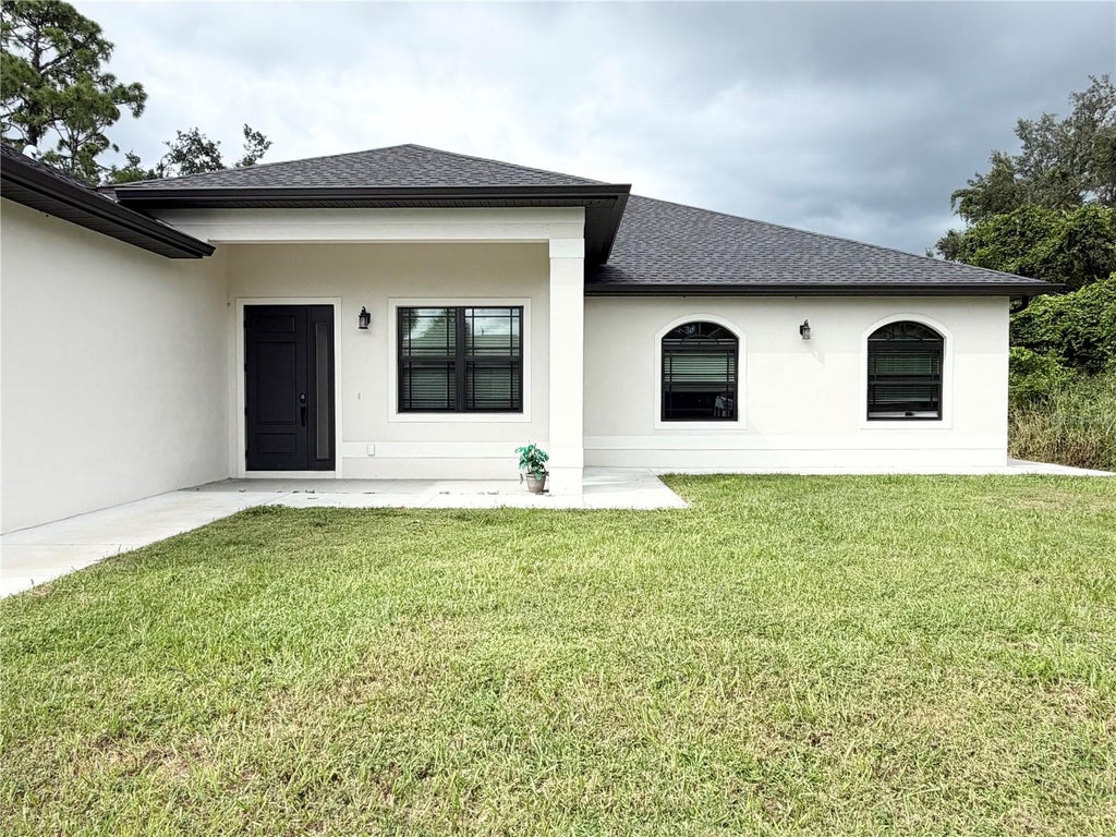 Photo of 17204 Bonnie Avenue, Port Charlotte, FL 33954 (MLS # A4707721)